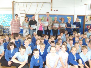 John Baron MP is presented with book at Sunnymede Junior School