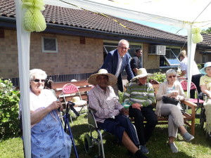 John with residents at the home